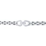 CARTIER - a diamond bracelet. The brilliant-cut diamond loops and connecting bar, with brick-link