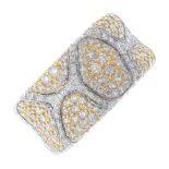 A diamond dress ring. Of animal print design, the pave-set diamond tri-colour curved panel, with