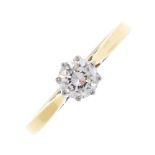 An 18ct gold diamond single-stone ring. The brilliant-cut diamond, with tapered shoulders and