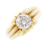A gentleman's 18ct gold diamond single-stone ring. The brilliant-cut diamond, with grooved sides and