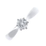 A platinum diamond single-stone ring. The brilliant-cut diamond, with tapered band. Estimated