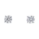 A pair of brilliant-cut diamond stud earrings. Estimated total diamond weight 2cts, H-I colour, SI