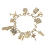 TIFFANY & CO. - a charm bracelet. The trace-link chain, suspending a series of twelve charms, to