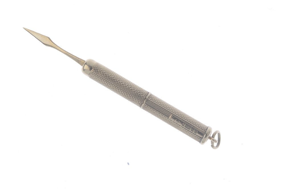 A 9ct gold retractable toothpick. With engine-turned case. Hallmarks for Birmingham, 1967. Length ( - Image 3 of 3