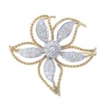 A diamond floral brooch. The brilliant-cut diamond cluster, within a similarly-cut diamond petal and