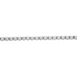 A diamond bracelet. The brilliant-cut diamond line, with push-piece clasp. Estimated total diamond