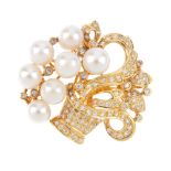 An 18ct gold diamond and cultured pearl jardiniere brooch. Designed as a pave-set diamond basket,