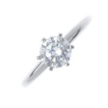 A diamond single-stone ring. The brilliant-cut diamond, to the tapered band. Estimated diamond