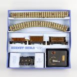 Three Hornby Dublo electric model railway train sets, EDG7 tank goods set LNER, a similar LMS