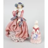 Two Royal Doulton figurines, the first Top o'the Hill, HN1849, 7 (18cm) high, plus Veronica Rd.