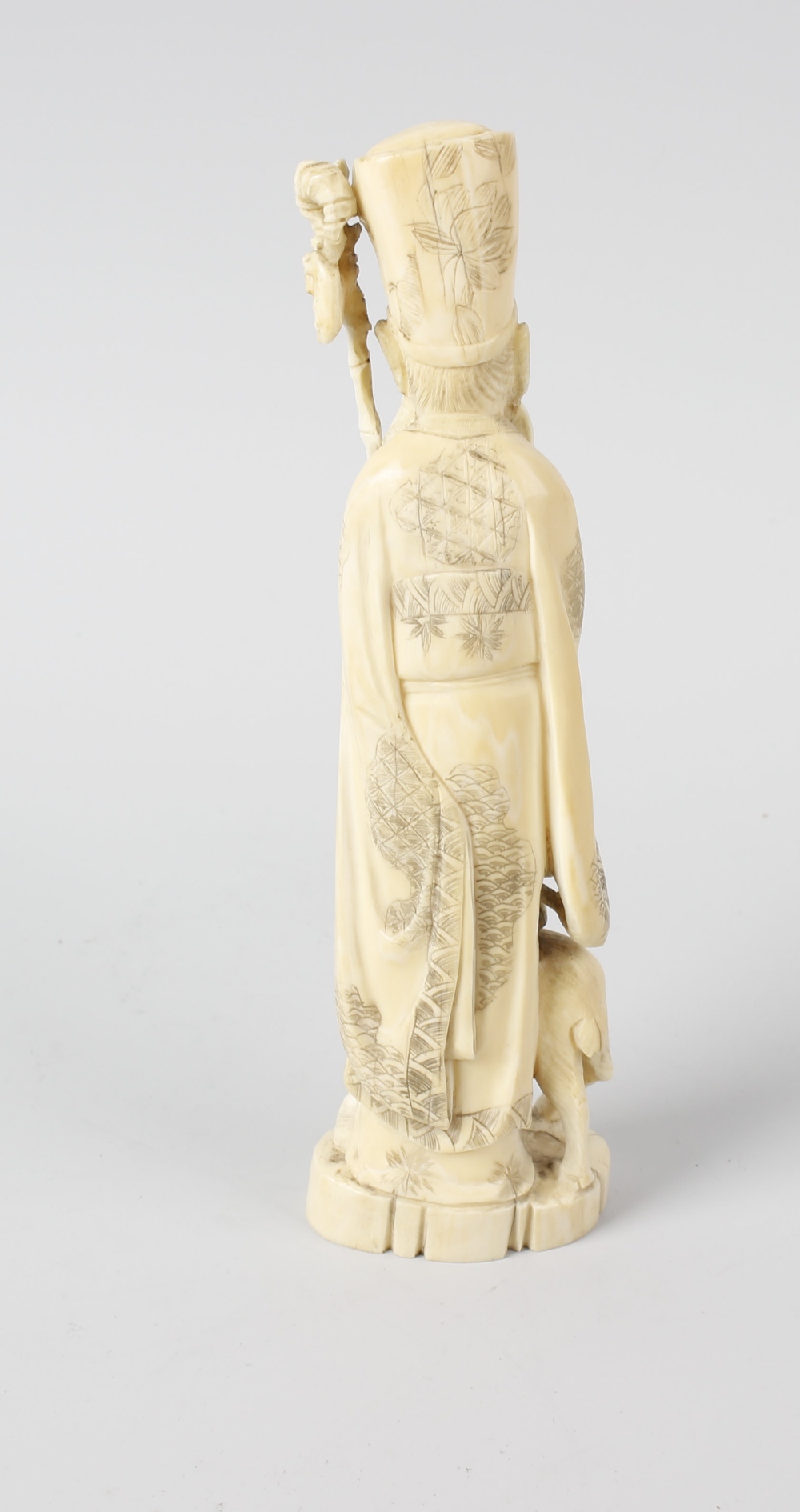 A Japanese late Meiji/Taisho period carved ivory okimono, modelled as Fukurokuju, the bearded - Image 2 of 3