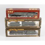 A box containing a selection of eight 00 gauge model railway locomotives, to include Mainline '