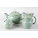 An Upchurch Pottery tea service in celadon green glaze, comprising a teapot, hot water jug and