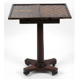 A William IV rosewood pedestal games table, having banded inlay to the hinged rectangular top