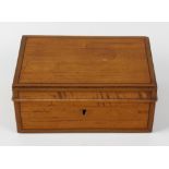 An Edwardian satinwood desk box. The hinged rectangular cover with stringing and crossbanding to
