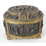 A late 19th century French gilt metal and bronzed oval bodied table casket, the hinged opening cover