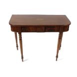 An early 19th century inlaid mahogany side table. The crossbanded top with rounded front corners and