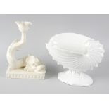 A Wedgwood Queensware 'dolphin' candlestick, on integral shell-moulded rectangular base, 9.75 (24.