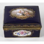 A 19th century porcelain box, of rectangular form, the dark blue glaze decorated with four floral