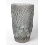 A Rene Lalique glass 'Coqs et Plumes' vase, design introduced 1928, of tapering cylindrical form