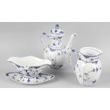 An extensive collection of Royal Copenhagen porcelain half-lace dinner and tea wares , principally