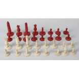 A 19th century carved and stained bone 'Barleycorn' pattern chess set, in mahogany wooden box with