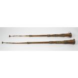 A pair of Tibetan copper telescopic 'dung' or temple horns, each of tapering dovetail-seamed three-