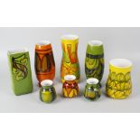 Eight various Poole pottery Delphis pattern vases, largest 9.25 (23.5cm) high. All with crazing,