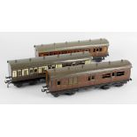 Four Bassett Lowke 0 gauge model railway passenger coaches, to include GWR 3rd class composite coach