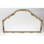 A lacquered wall mirror, of scalloped arched form, the frame decorated with Oriental figures and