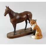 A Royal Worcester model of a seated fox, 7.5 (19cm), together with a Beswick bay horse, Arkle