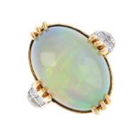 An opal and diamond ring. The oval opal cabochon, with square-shape and brilliant-cut diamond sides.
