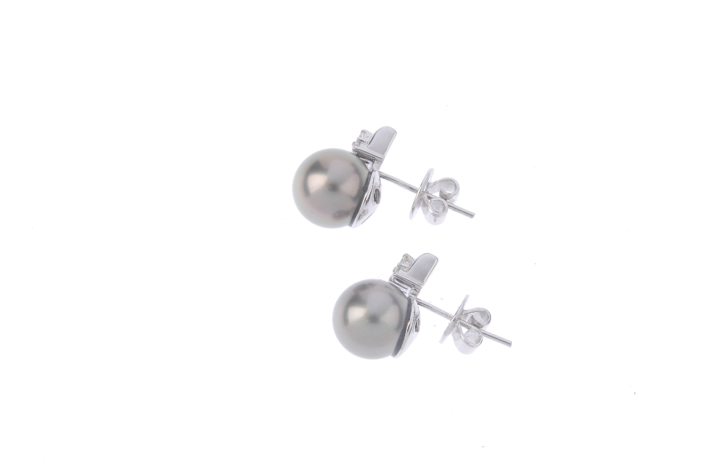 A pair of cultured pearl and diamond earrings. Each designed as a grey cultured pearl, measuring 9. - Image 2 of 2