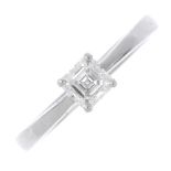 A platinum diamond single-stone ring. The asscher-cut diamond, weighing 0.51ct, with tapered