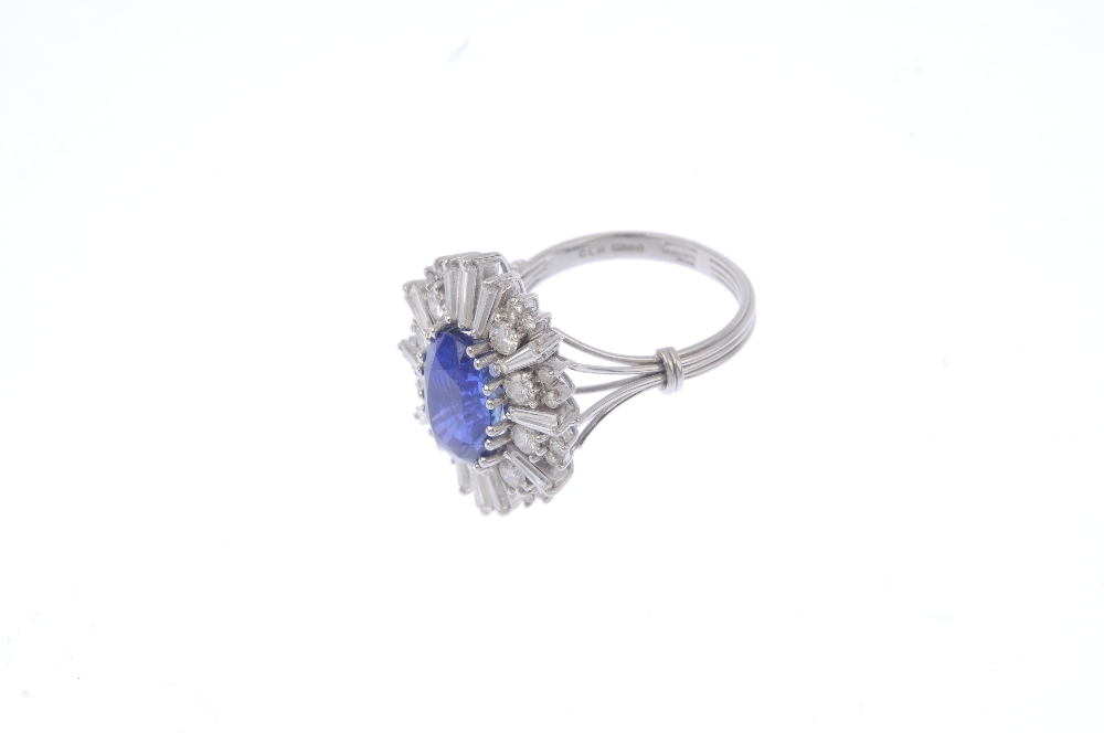 An 18ct gold Burmese sapphire and diamond cocktail ring. The oval-shape sapphire, with alternating - Image 3 of 4
