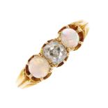 An early 20th century 18ct gold diamond and opal three-stone ring. The old-cut diamond, with