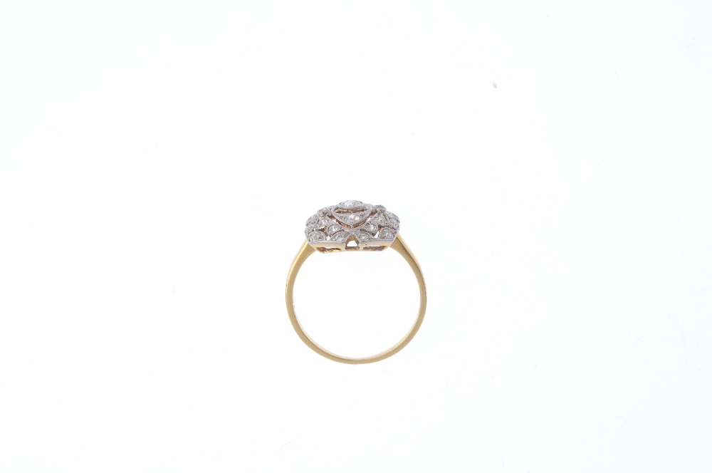 An Art Deco platinum and 18ct gold diamond ring. Of openwork design, the circular-cut diamond - Image 2 of 5