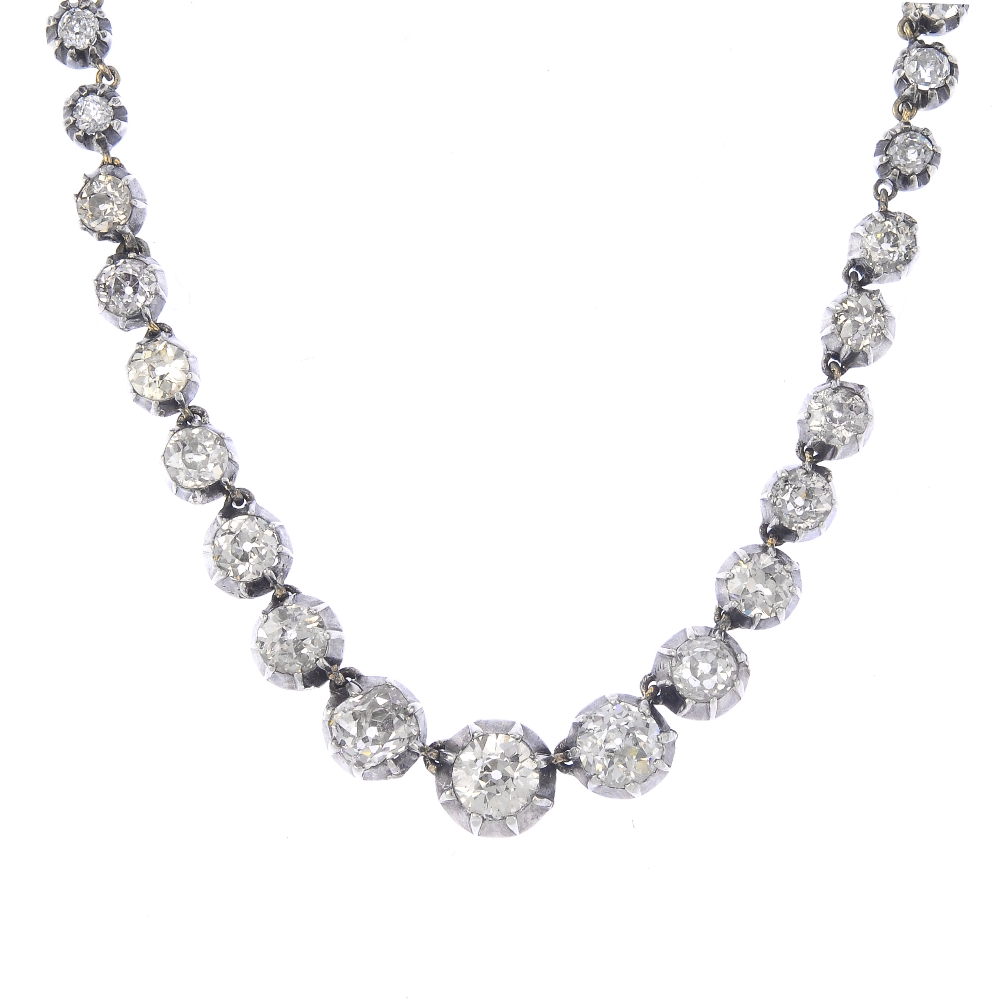 A diamond necklace. Designed as a graduated old-cut diamond line, with push-piece clasp. Estimated