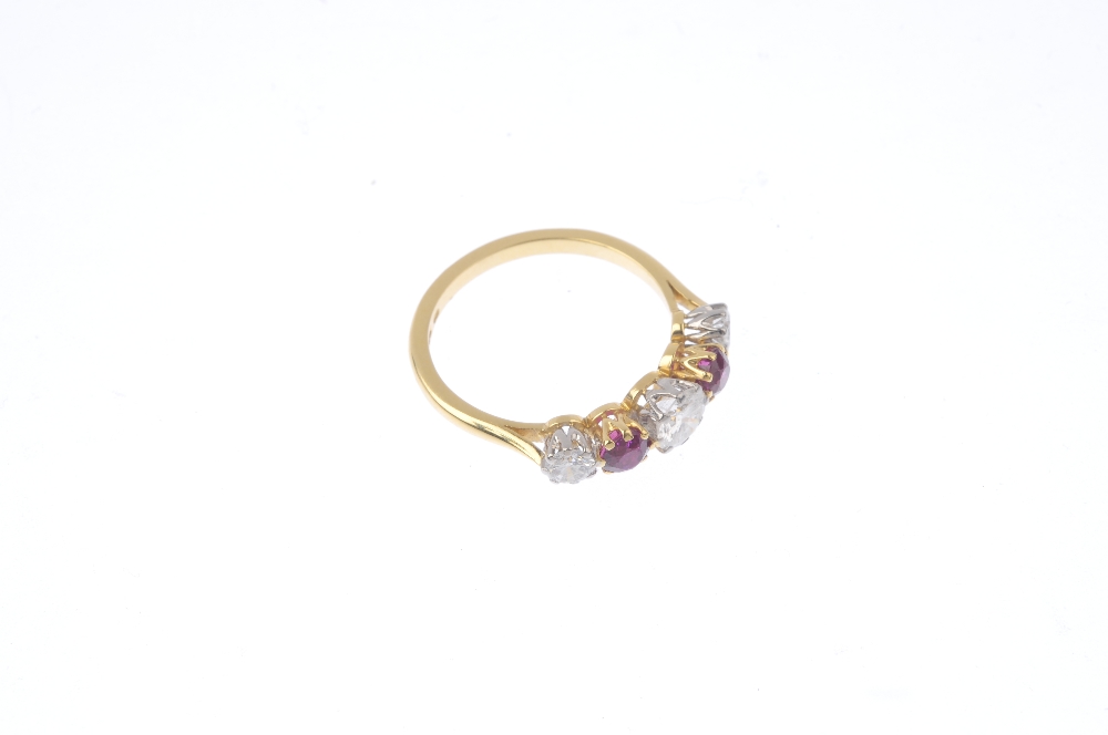 An 18ct gold diamond and ruby five-stone ring. The alternating, graduated brilliant-cut diamond - Image 4 of 4