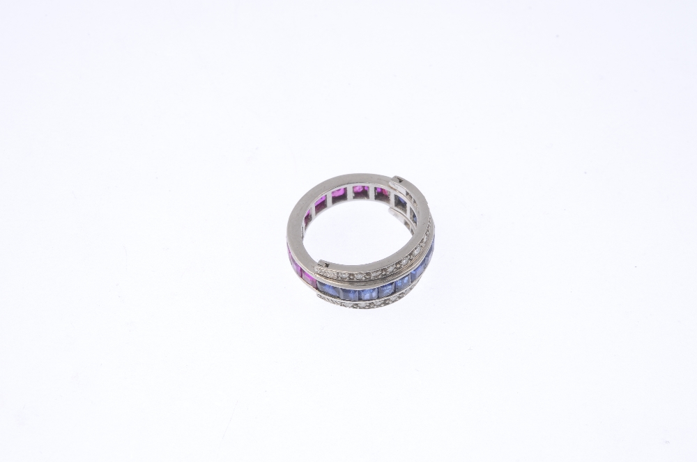 A sapphire, ruby and diamond flip ring. The calibre-cut sapphire and ruby full-circle eternity ring, - Image 4 of 5