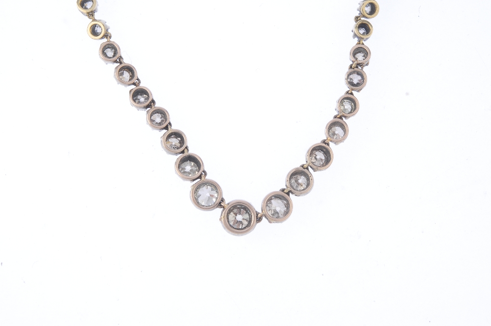 A diamond necklace. Designed as a graduated old-cut diamond line, with push-piece clasp. Estimated - Image 2 of 2