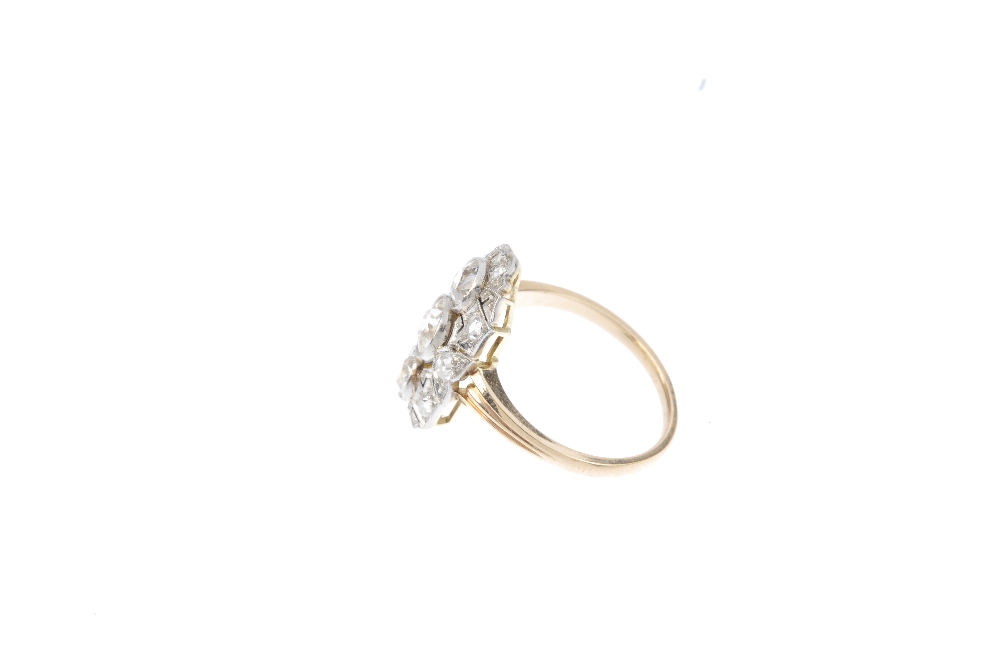 An early 20th century gold and platinum diamond dress ring. Designed as three graduated old-cut - Image 2 of 3