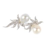 A South Sea cultured pearl and diamond floral brooch. Designed as two South Sea cultured pearls,