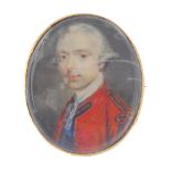 A portrait miniature brooch. Of oval outline, the hand painted panel depicting a gentleman in period