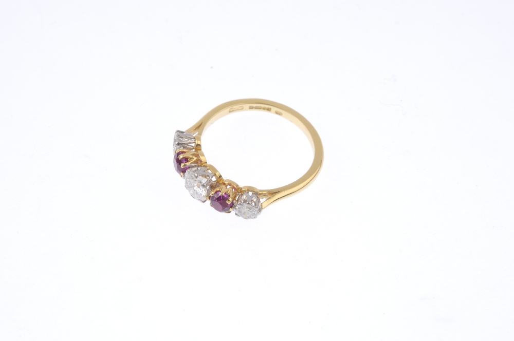 An 18ct gold diamond and ruby five-stone ring. The alternating, graduated brilliant-cut diamond - Image 3 of 4