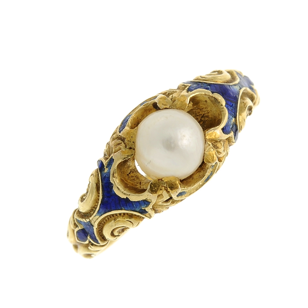 A mid Victorian gold ring. The centrally set cultured pearl to the scrolling surround and