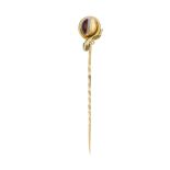 A banded agate and diamond coiled snake stickpin. The circular banded agate, with snake coiled