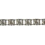 A late Victorian silver belt. Designed as a series of openwork square-shape links, each with a