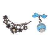 A selection of jewellery. To include a Nadine blue enamel pendant watch, a marcasite double clip, a