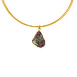 A gold plated ruby and zoisite necklace, earrings and ring set. Each designed with a rough panel